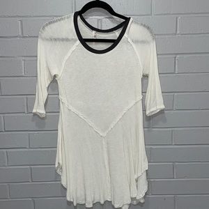 Cream quarter length sleeve shirt